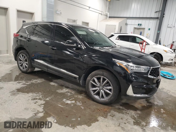 2021 Acura RDX w/Advance Package with VIN 5J8TC2H77ML806344, listed as a Copart auction lot 85794344 with 56,135 mi miles and Clean Title. Bid and sale history available at carsss.com. Image 4.