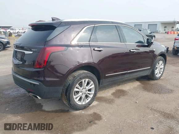 2021 Cadillac XT5 FWD Luxury with VIN 1GYKNAR44MZ184070, listed as a IAAI auction lot 41934265 with 60,596 mi miles and . Bid and sale history available at DreamBid. Image 4.