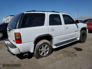 2002 GMC Yukon Denali with VIN 1GKEK63UX2J183619, listed as a Copart auction lot 74744354 with 155,188 mi miles and Salvage Title. Bid and sale history available at carsss.com. Image 3.