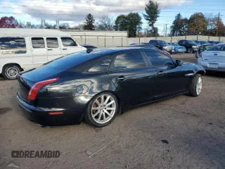 2015 Jaguar XJ Portfolio with VIN SAJWJ2GD2F8V76289, listed as a Copart auction lot 48222815 with 95,420 mi miles and Salvage title. Bid and sale history available at DreamBid. Image 3.