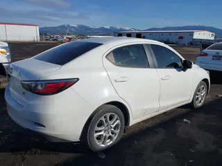 2016 Scion iA z VIN 3MYDLBZV2GY107457, wystawiony jako IAAI lot #38939578 z przebiegiem 99 928 mil mil oraz . Historia ofert i sprzedaży dostępna na DreamBid. Obrazek 4.
