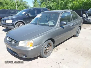 2001 Hyundai Accent GLS z VIN KMHCG35C01U136132, wystawiony jako IAAI lot #42293830 z przebiegiem 111 906 mil mil oraz . Historia ofert i sprzedaży dostępna na DreamBid. Obrazek 2.