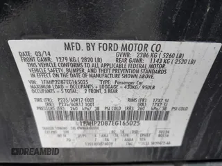 2014 Ford Taurus SE z VIN 1FAHP2D87EG165025, wystawiony jako IAAI lot #42226401 z przebiegiem 209 411 mil mil oraz . Historia ofert i sprzedaży dostępna na DreamBid. Obrazek 9.