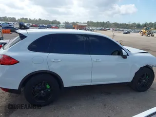 2014 Porsche Cayenne S z VIN WP1AB2A2XELA58986, wystawiony jako IAAI lot #41577501 z przebiegiem 53 672 mil mil oraz . Historia ofert i sprzedaży dostępna na DreamBid. Obrazek 13.