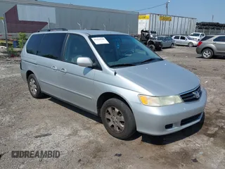 2004 Honda Odyssey EX with VIN 5FNRL18694B093041, listed as a IAAI auction lot 42429540 with 193,845 mi miles and . Bid and sale history available at DreamBid. Image 1.