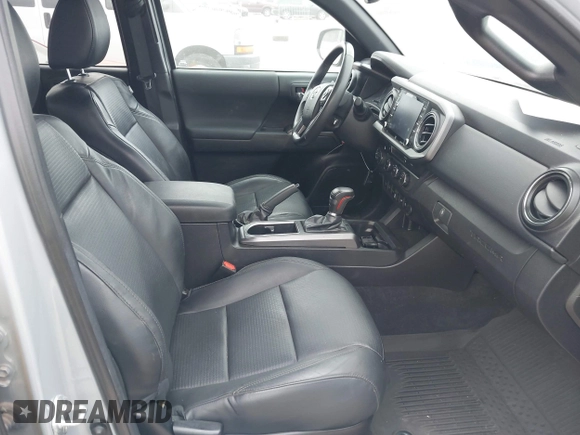 2021 Toyota Tacoma 4WD SR5 with VIN 3TMDZ5BN5MM116584, listed as a IAAI auction lot 41548175 with 23,031 mi miles. Bid and sale history available at carsss.com. Image 5.