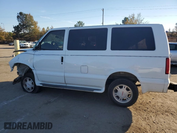 2003 GMC Safari z VIN 1GKDM19X93B516849, wystawiony jako Copart lot #82296404 z przebiegiem Nie podano mil oraz Szkoda całkowita • Salvage title. Historia ofert i sprzedaży dostępna na DreamBid. Obrazek 2.