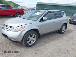 2003 Nissan Murano SE z VIN JN8AZ08W43W214000, wystawiony jako IAAI lot #42274384 z przebiegiem 98 927 mil mil oraz . Historia ofert i sprzedaży dostępna na DreamBid. Obrazek 2.