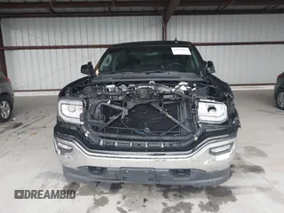 2017 GMC Sierra 1500 SLE z VIN 1GTV2MEC2HZ324763, wystawiony jako IAAI lot #42234082 z przebiegiem 106 984 mil mil oraz . Historia ofert i sprzedaży dostępna na DreamBid. Obrazek 12.