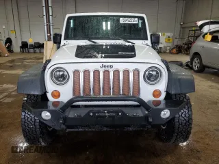 2013 Jeep Wrangler Rubicon 10th Anniversary z VIN 1C4BJWCGXDL543958, wystawiony jako Copart lot #58492255 z przebiegiem 94 455 mil mil oraz Szkoda całkowita • Salvage title. Historia ofert i sprzedaży dostępna na DreamBid. Obrazek 5.
