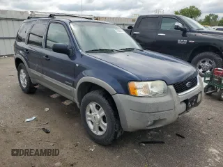2002 Ford Escape XLT Choice with VIN 1FMYU04192KD87001, listed as a Copart auction lot 57860475 with 195,323 mi miles and Salvage title. Bid and sale history available at DreamBid. Image 4.