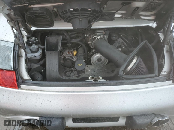 2003 Porsche 911 z VIN WP0AA29983S620988, wystawiony jako Copart lot #49378715 z przebiegiem 99 291 mil mil oraz Szkoda całkowita • Salvage title. Historia ofert i sprzedaży dostępna na DreamBid. Obrazek 11.