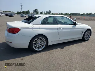 2015 BMW 4 Series 428i with VIN WBA3V7C57FP772880, listed as a Copart auction lot 62740295 with 107,673 mi miles and Salvage title. Bid and sale history available at DreamBid. Image 3.