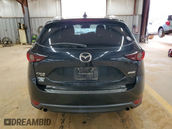 2019 Mazda CX-5 Touring with VIN JM3KFBCM4K0571793, listed as a Copart auction lot 49696825 with 97,305 mi miles and Salvage Title. Bid and sale history available at carsss.com. Image 6.