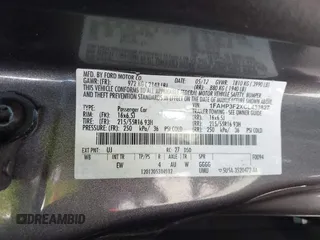 2012 Ford Focus SE with VIN 1FAHP3F2XCL433827, listed as a IAAI auction lot 41843960 with 156,343 mi miles. Bid and sale history available at carsss.com. Image 9.