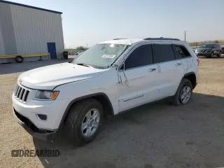 2016 Jeep Grand Cherokee Laredo with VIN 1C4RJEAG8GC329275, listed as a Copart auction lot 63297965 with 122,332 mi miles and Salvage title. Bid and sale history available at DreamBid. Image 1.