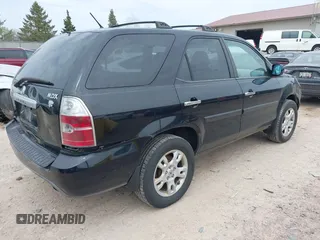 2004 Acura MDX Touring Pkg with VIN 2HNYD18694H551917, listed as a IAAI auction lot 42130100 with 207,699 mi miles. Bid and sale history available at carsss.com. Image 4.