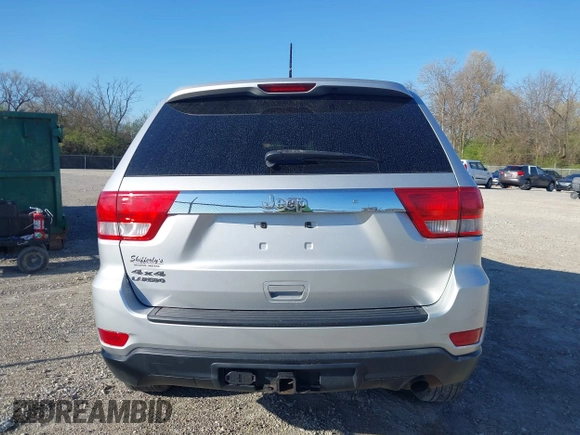 2013 Jeep Grand Cherokee Laredo with VIN 1C4RJFAG3DC586667, listed as a IAAI auction lot 42041524 with 100,635 mi miles. Bid and sale history available at carsss.com. Image 16.