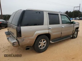 2000 Cadillac Escalade z VIN 1GYEK63R9YR218680, wystawiony jako Copart lot #87393204 z przebiegiem 295 494 mil mil oraz Szkoda całkowita • Salvage title. Historia ofert i sprzedaży dostępna na DreamBid. Obrazek 3.
