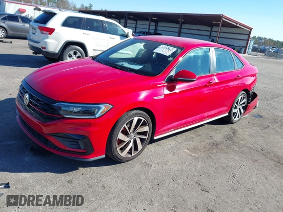 2019 Volkswagen Jetta GLI S z VIN 3VW5T7BU3KM225015, wystawiony jako IAAI lot #41352228 z przebiegiem 96 874 mil mil oraz . Historia ofert i sprzedaży dostępna na DreamBid. Obrazek 17.