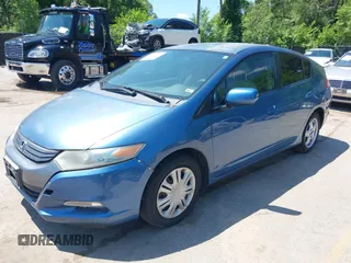 2010 Honda Insight LX with VIN JHMZE2H56AS013649, listed as a IAAI auction lot 42646690 with 5,593 mi miles and . Bid and sale history available at DreamBid. Image 2.