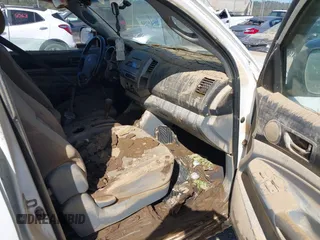 2006 Toyota Tacoma z VIN 3TMLU42N26M004719, wystawiony jako IAAI lot #40569250 z przebiegiem Nie podano mil oraz . Historia ofert i sprzedaży dostępna na DreamBid. Obrazek 5.