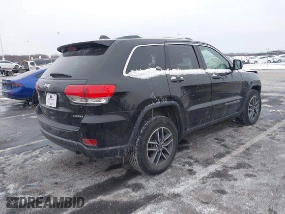 2019 Jeep Grand Cherokee Laredo E with VIN 1C4RJFAGXKC834233, listed as a IAAI auction lot 41392437 with 81,005 mi miles. Bid and sale history available at carsss.com. Image 4.