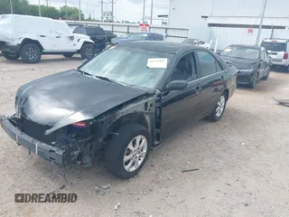 2005 Toyota Camry LE with VIN 4T1BF32K15U091945, listed as a IAAI auction lot 42124503 with 212,951 mi miles and . Bid and sale history available at DreamBid. Image 2.
