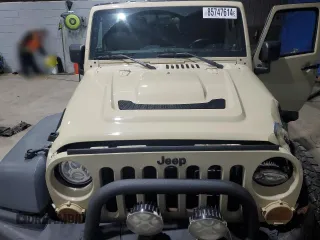 2012 Jeep Wrangler Unlimited Call of Duty MW3 with VIN 1C4BJWFGXCL105130, listed as a Copart auction lot 85747614 with 77,953 mi miles and Salvage title. Bid and sale history available at DreamBid. Image 11.