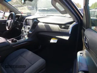 2019 Chevrolet Suburban LS with VIN 1GNSKGKC2KR353977, listed as a IAAI auction lot 42129814 with 85,454 mi miles and . Bid and sale history available at DreamBid. Image 5.