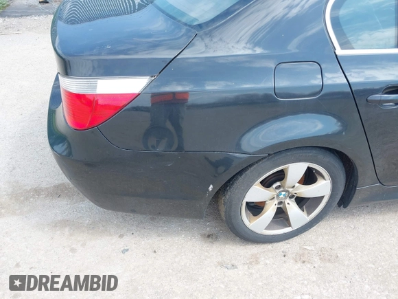 2007 BMW 5 Series 530i with VIN WBANE73597CM56897, listed as a IAAI auction lot 42113113 with 212,774 mi miles. Bid and sale history available at carsss.com. Image 6.