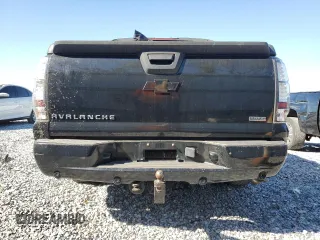 2010 Chevrolet Avalanche LTZ with VIN 3GNNCGE04AG250747, listed as a Copart auction lot 48952615 with 142,136 mi miles and Salvage Title. Bid and sale history available at DreamBid. Image 6.