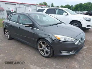 2016 Ford Focus Titanium with VIN 1FADP3J28GL251183, listed as a IAAI auction lot 42636773 with 124,729 mi miles and . Bid and sale history available at DreamBid. Image 1.