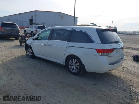 2016 Honda Odyssey EX-L z VIN 5FNRL5H60GB011001, wystawiony jako IAAI lot #41897958 z przebiegiem 126 133 mil mil oraz . Historia ofert i sprzedaży dostępna na DreamBid. Obrazek 3.