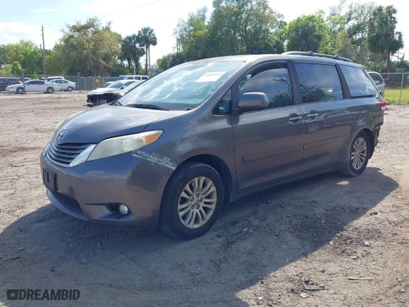 2012 Toyota Sienna XLE AAS with VIN 5TDYK3DC8CS178369, listed as a IAAI auction lot 41803184 with 249,587 mi miles. Bid and sale history available at carsss.com. Image 2.