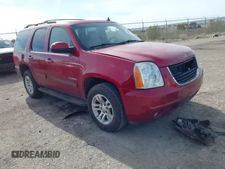 2013 GMC Yukon SLE with VIN 1GKS1AE07DR309832, listed as a IAAI auction lot 41014906 with 203,346 mi miles. Bid and sale history available at carsss.com. Image 1.