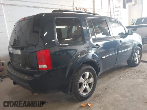 2009 Honda Pilot EX-L with VIN 5FNYF48509B036410, listed as a IAAI auction lot 41859708 with 216,558 mi miles. Bid and sale history available at carsss.com. Image 4.