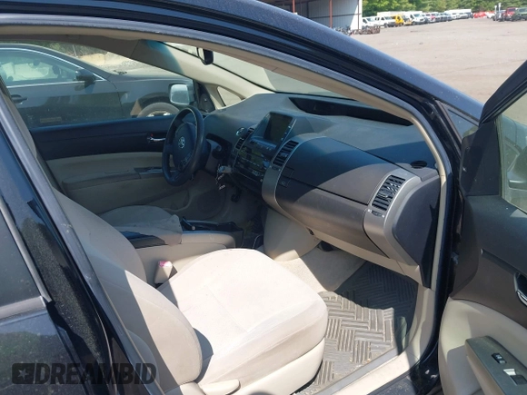 2005 Toyota Prius z VIN JTDKB20U953001557, wystawiony jako IAAI lot #42409183 z przebiegiem 179 292 mil mil oraz . Historia ofert i sprzedaży dostępna na DreamBid. Obrazek 5.