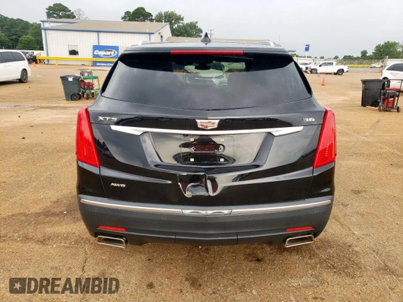 2017 Cadillac XT5 Premium Luxury AWD with VIN 1GYKNERS3HZ214851, listed as a Copart auction lot 60112185 with 74,045 mi miles and Salvage title. Bid and sale history available at DreamBid. Image 6.