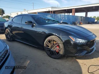 2021 Maserati Ghibli S with VIN ZAM57YSA6M1368667, listed as a Copart auction lot 73985054 with Not provided miles and Salvage title. Bid and sale history available at DreamBid. Image 4.
