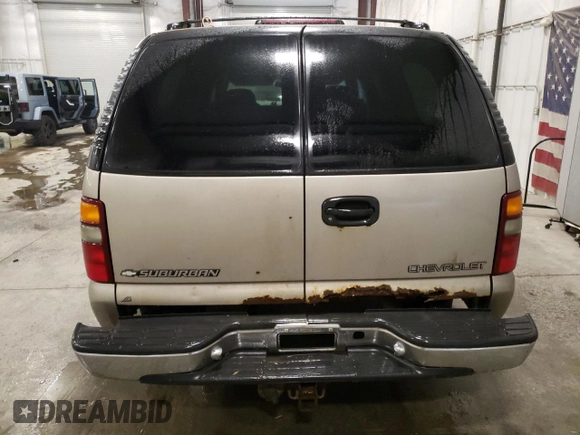 2000 Chevrolet Suburban with VIN 1GNFK16T9YJ169393, listed as a Copart auction lot 84970004 with 304,002 mi miles and Salvage Title. Bid and sale history available at carsss.com. Image 6.