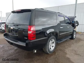 2009 Chevrolet Suburban LTZ with VIN 1GNFK36389J124653, listed as a IAAI auction lot 41935393 with 117,144 mi miles. Bid and sale history available at carsss.com. Image 4.