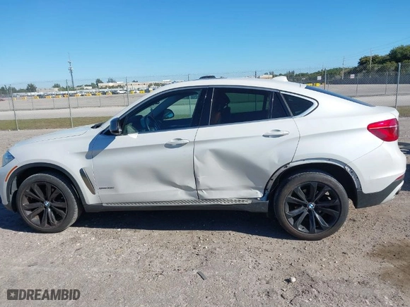 2016 BMW X6 xDrive35i with VIN 5UXKU2C57G0N81974, listed as a IAAI auction lot 41821867 with 144,643 mi miles. Bid and sale history available at carsss.com. Image 14.