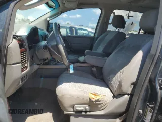 2005 Nissan Armada LE z VIN 5N1AA08A95N738884, wystawiony jako Copart lot #56823015 z przebiegiem 183 395 mil mil oraz Czysty tytuł • Clean title. Historia ofert i sprzedaży dostępna na DreamBid. Obrazek 7.