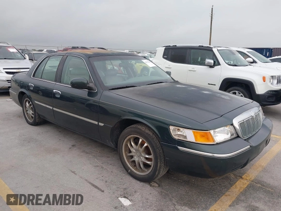 2002 Mercury Grand Marquis LS Premium z VIN 2MEFM75WX2X626520, wystawiony jako IAAI lot #42374203 z przebiegiem 139 692 mil mil oraz . Historia ofert i sprzedaży dostępna na DreamBid. Obrazek 1.