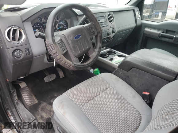 2012 Ford F-250 XL with VIN 1FT7W2B69CEB27556, listed as a Copart auction lot 62176985 with 171,669 mi miles and Salvage title. Bid and sale history available at DreamBid. Image 8.