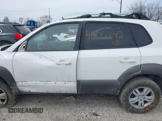 2006 Hyundai Tucson GLS with VIN KM8JN72D26U322893, listed as a IAAI auction lot 41882842 with 116,972 mi miles. Bid and sale history available at carsss.com. Image 14.