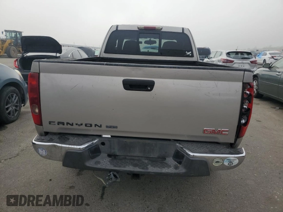 2008 GMC Canyon z VIN 1GTDS19E788107379, wystawiony jako Copart lot #83791414 z przebiegiem 161 630 mil mil oraz Szkoda całkowita • Salvage title. Historia ofert i sprzedaży dostępna na DreamBid. Obrazek 6.