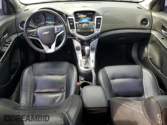 2014 Chevrolet Cruze 2LT z VIN 1G1PE5SB9E7436879, wystawiony jako Copart lot #59379565 z przebiegiem 183 282 mil mil oraz Czysty tytuł • Clean title. Historia ofert i sprzedaży dostępna na DreamBid. Obrazek 8.