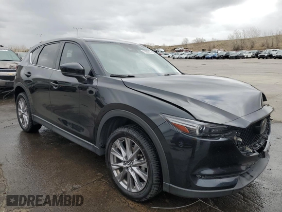 2019 Mazda CX-5 Grand Touring with VIN JM3KFBDM2K0650314, listed as a Copart auction lot 51606755 with 88,630 mi miles and Salvage Title. Bid and sale history available at carsss.com. Image 4.